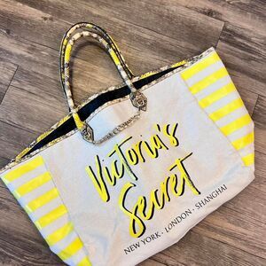 Victoria's Secret yellow and white striped large tote bag.